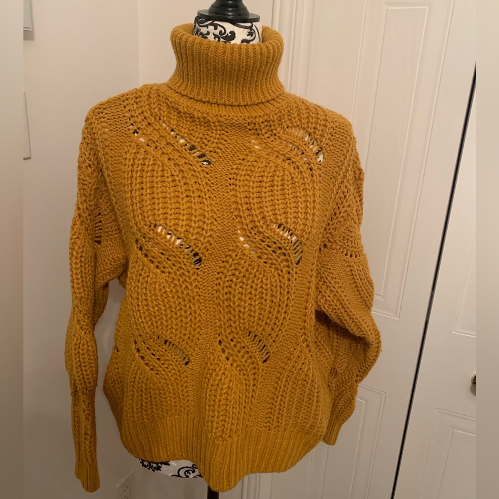 Beautiful mustard sweater.